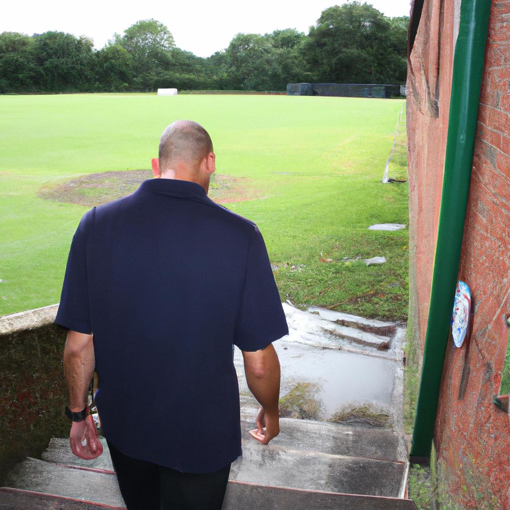 Person inspecting cricket club facilities